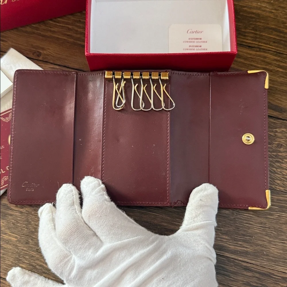 Cartier Burgundy Leather Key Card Holder with Gold plated corners w/ box